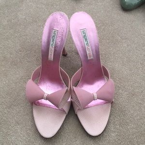 A pair of gently worn 4 inch Ungaro Fuchsia heels